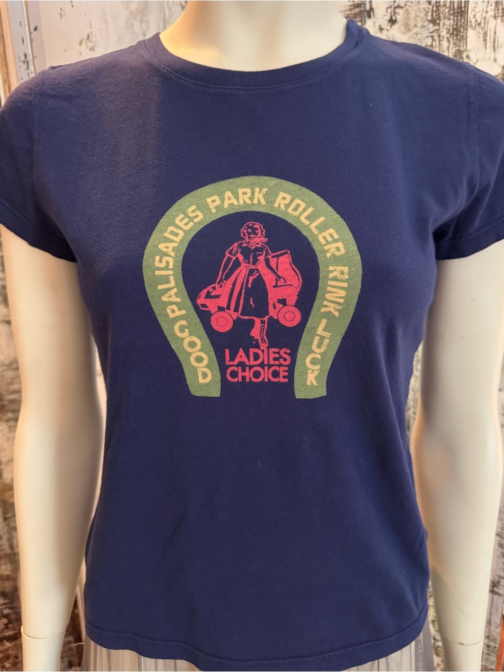 Roller Derby Jake’s tee size small. Vibrant colors. Retro graphic.